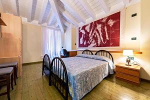 Postel nebo postele na pokoji v ubytování Casa Vacanze Baccolo