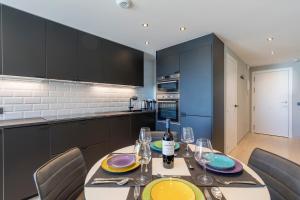 Kuchyň nebo kuchyňský kout v ubytování MEDANO4YOU Tejita Dream Penthouse