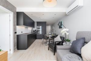 Kuchyň nebo kuchyňský kout v ubytování MEDANO4YOU Tejita Dream Penthouse