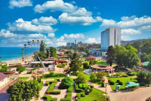 an amusement park with a ferris wheel and a city at International Hotel Casino & Tower Suites in Golden Sands