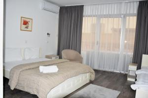 Giường trong phòng chung tại Garni Hotel Hamburg