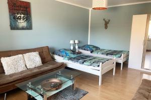 Postel nebo postele na pokoji v ubytování Apartments Hemer