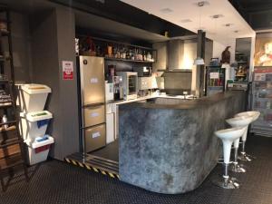 A kitchen or kitchenette at Taipei Discover Hostel