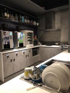 A kitchen or kitchenette at Taipei Discover Hostel
