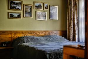 A bed or beds in a room at Kum Pansiyon