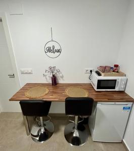 Una cocina o zona de cocina en Apartamentos Los Cabezuelos, Dream Views
