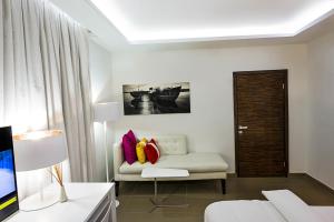 Ένα ή περισσότερα κρεβάτια σε δωμάτιο στο Maison Fahrenheit