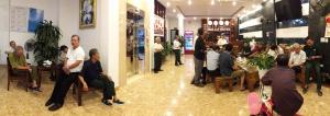 a group of people sitting in chairs in a store at Hoa Lu Hotel in Bản Giỏ (1)