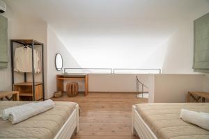 Postel nebo postele na pokoji v ubytování Seashell Luxury Residence - Apartment 1 + 31 fotografií