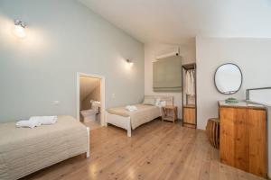 Postel nebo postele na pokoji v ubytování Seashell Luxury Residence - Apartment 1