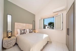 Postel nebo postele na pokoji v ubytování Seashell Luxury Residence - Apartment 1