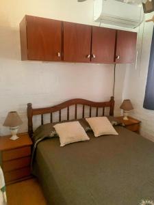 アトランティダにあるAtlantic 10のベッドルーム1室(枕2つ付)