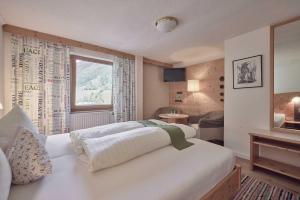 Postel nebo postele na pokoji v ubytování Bio Hotel Stillebach