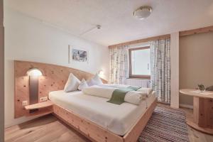 Postel nebo postele na pokoji v ubytování Bio Hotel Stillebach