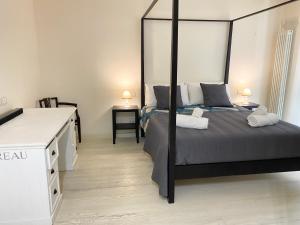 Postel nebo postele na pokoji v ubytování Front Beach Deluxe Apartment - with access to beach club