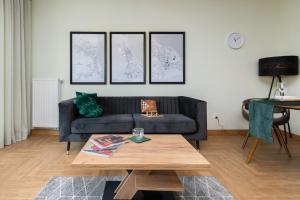 Area tempat duduk di Grano Green Comfort Residence by Renters Prestige
