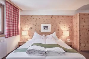Postel nebo postele na pokoji v ubytování Bio Hotel Stillebach