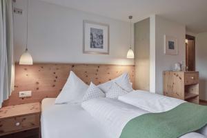 Postel nebo postele na pokoji v ubytování Bio Hotel Stillebach