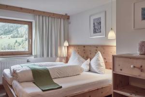 Postel nebo postele na pokoji v ubytování Bio Hotel Stillebach