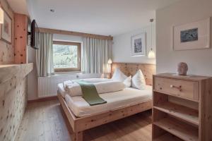 Postel nebo postele na pokoji v ubytování Bio Hotel Stillebach