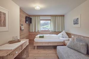 Postel nebo postele na pokoji v ubytování Bio Hotel Stillebach