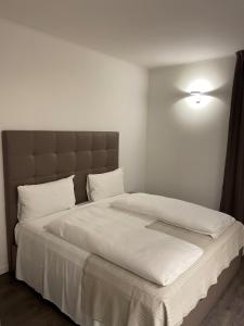 Posteľ alebo postele v izbe v ubytovaní Hotel Studio Inn Centrale & Milano Urban Padel
