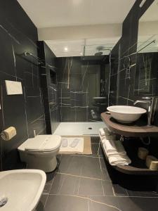 Kúpeľňa v ubytovaní Hotel Studio Inn Centrale & Milano Urban Padel