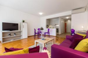 TV a/nebo společenská místnost v ubytování Tertianum Residenza Al Lido - Appartements & Restaurant