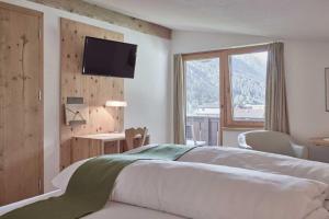 Postel nebo postele na pokoji v ubytování Bio Hotel Stillebach