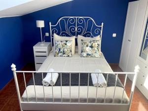 En eller flere senge i et værelse på Casa rural en Asturias