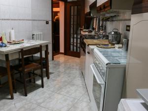 A kitchen or kitchenette at Casa Vacanze Scalone