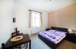 Postel nebo postele na pokoji v ubytování Hostel Foster