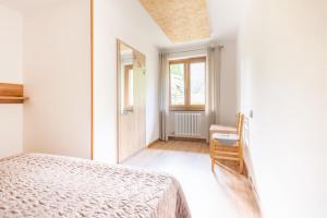 Postel nebo postele na pokoji v ubytování CROSINA HOLIDAY - Casa Lucia