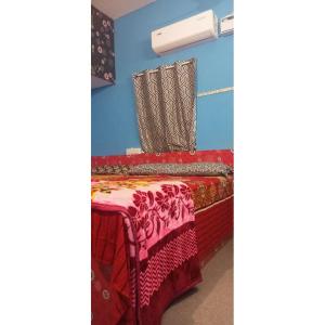 Ein Bett oder Betten in einem Zimmer der Unterkunft Linga Homestay