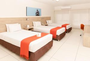 Ліжко або ліжка в номері Casa Andina Standard Piura