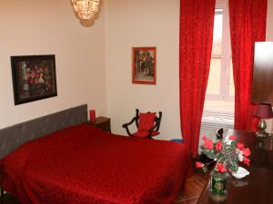 A bed or beds in a room at Casa Vacanze Scalone