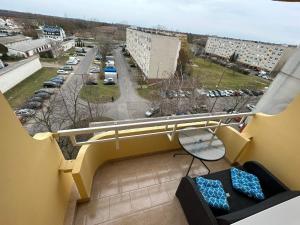 a balcony with a view of a parking lot at Rebeka 2 in Nyíregyháza