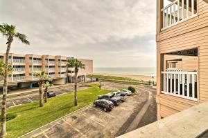 a view of the beach from the balcony of a building at Seaside Corpus Christi Condo at The Villa del Sol! in Corpus Christi