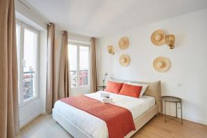 Posteľ alebo postele v izbe v ubytovaní Residence Center of Paris le Marais by Studio prestige