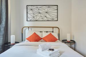 Posteľ alebo postele v izbe v ubytovaní Residence Center of Paris le Marais by Studio prestige
