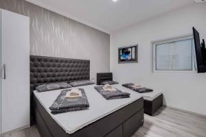 Posteľ alebo postele v izbe v ubytovaní Crikvenica Apartment 18 + 37 fotografií