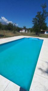 Swimming pool sa o malapit sa Casas de Campo Famailla