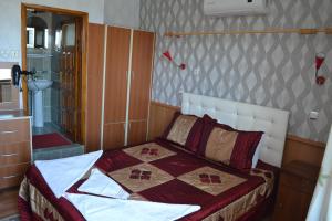 Кровать или кровати в номере Aspawa Hotel