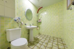 a bathroom with a toilet and a sink at Clear morning pet friendly pension in Gyeongju