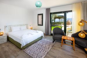 En eller flere senge i et værelse på Beacon Hill Suites