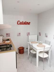 A kitchen or kitchenette at Antonella home b&b