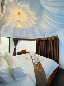 Voodi või voodid majutusasutuse Kravanh Camping Cardamom Mountain toas