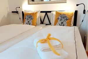 Rúm í herbergi á Homelystay Graz - downtown app