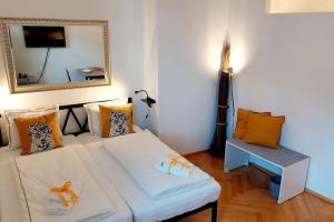 Rúm í herbergi á Homelystay Graz - downtown app