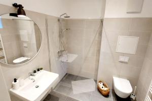Baðherbergi á Homelystay Graz - downtown app